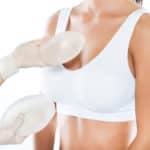 doctor choosing mammary prosthesis with her patient